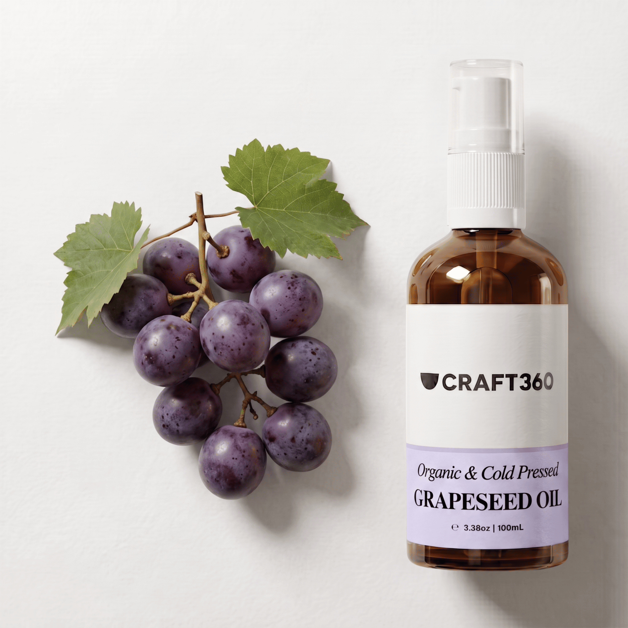 Certified Organic Grapeseed Oil displayed alongside grapes showing its natural botanical source