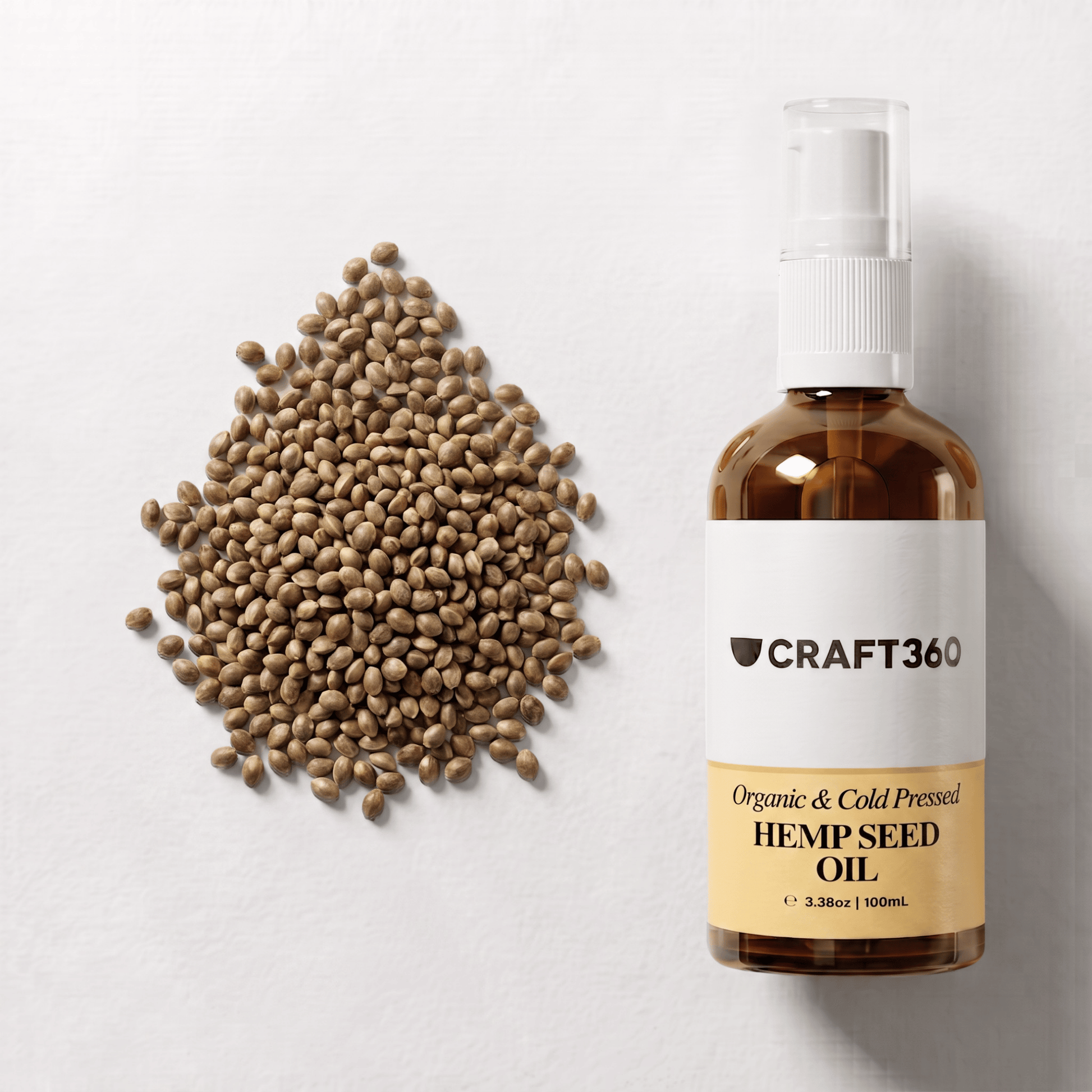 Organic Golden Hemp Seed Oil displayed alongside hemp seeds showing its natural botanical source