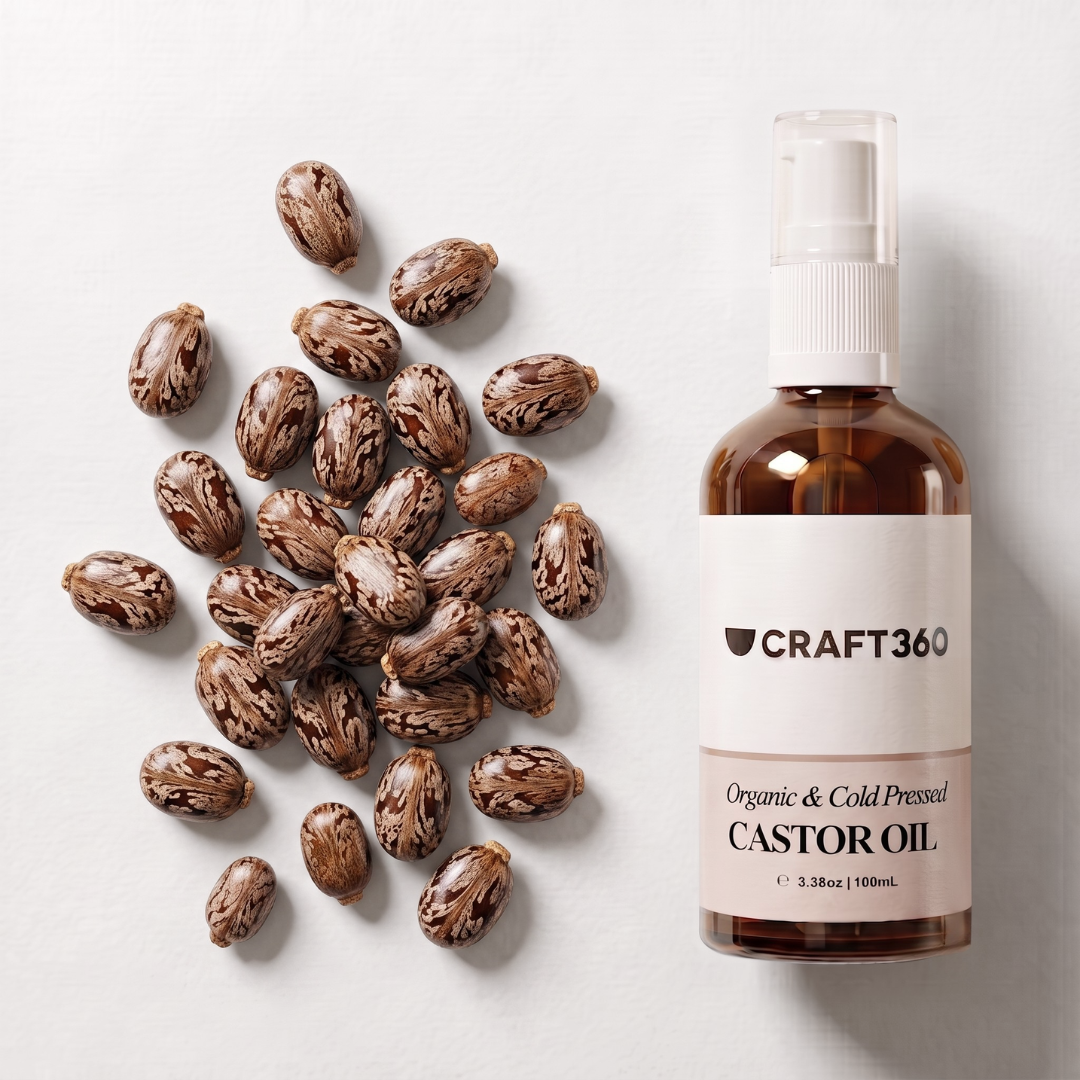 A bottle of Craft360 Organic & Cold Pressed Castor Oil next to a scattered pile of raw castor seeds on a light gray background.